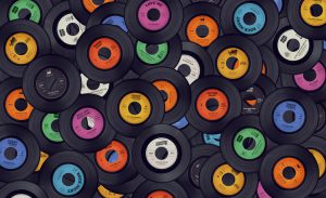 A background of vinyl records. The labels are not real but fake artists, producers, legal text and logo's.